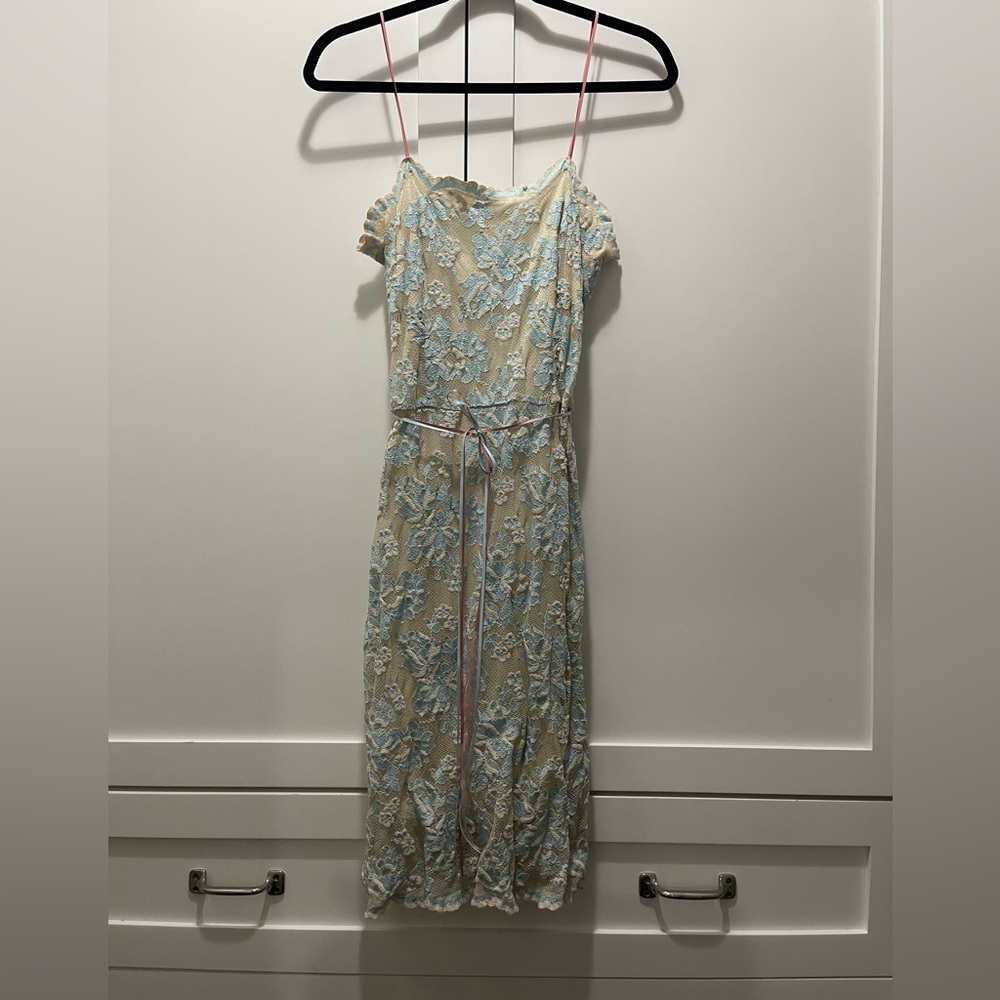 Stunning lace Milly dress. Dainty pink straps. Worn once.